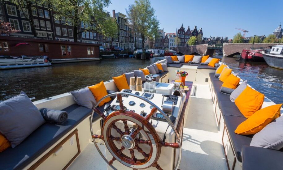 Open boat in Amsterdam canal