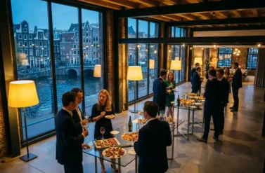 Corporate party in modern Amsterdam office with employees mingling, appetizers on glass tables, canal view at dusk